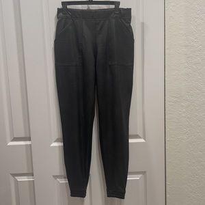 Spanx black leather like joggers in size L